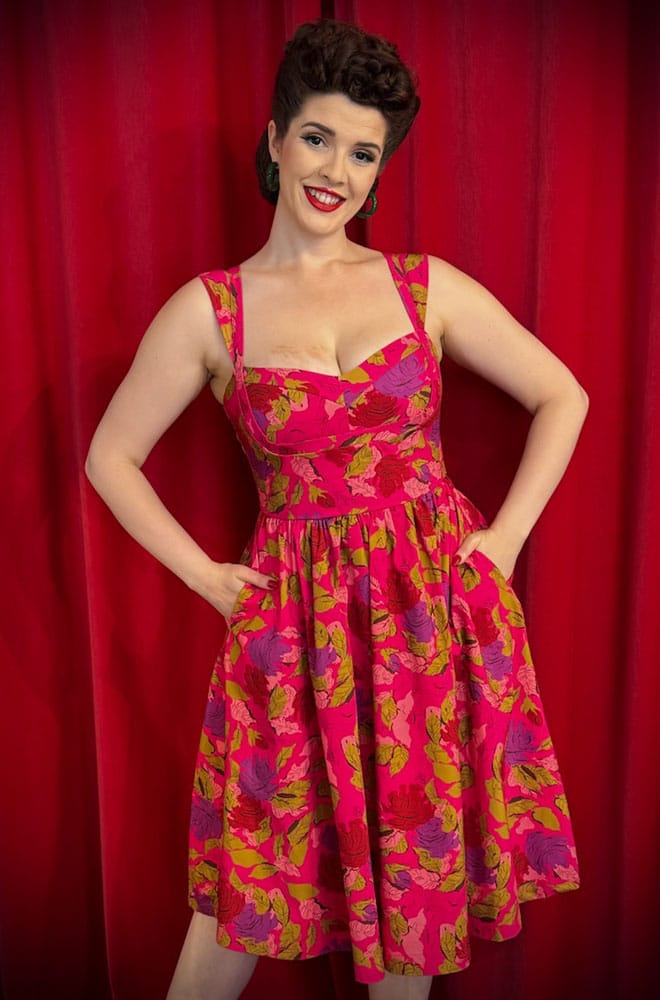 The Anna 1950s Floral Swing Dress is a darling 50s-style summer dress in a sassy floral print. Perfect with a petticoat, ideal for weddings.