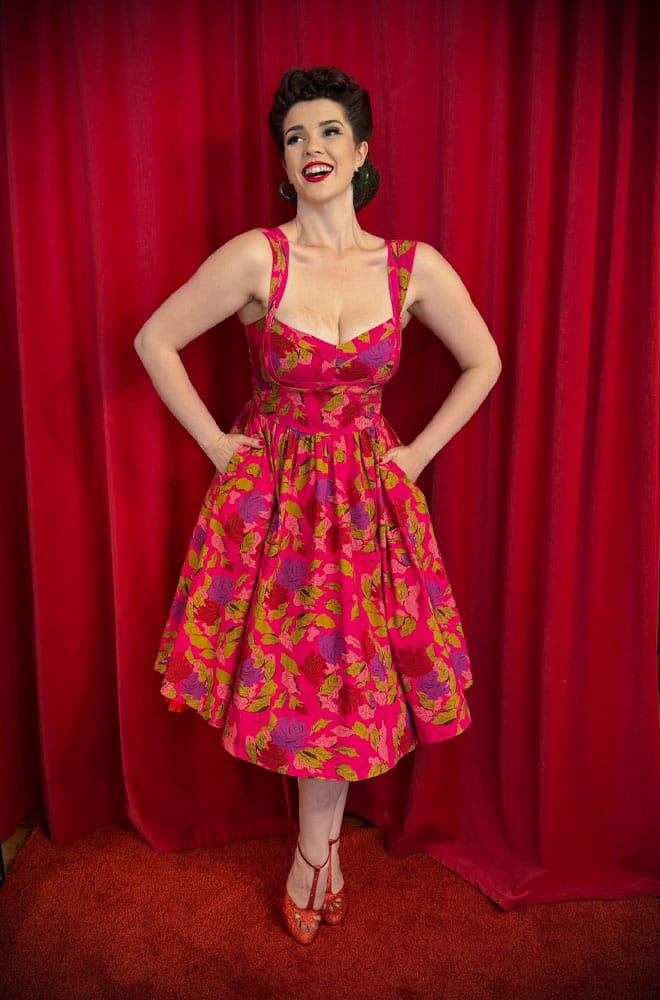 The Anna 1950s Floral Swing Dress is a darling 50s-style summer dress in a sassy floral print. Perfect with a petticoat, ideal for weddings.