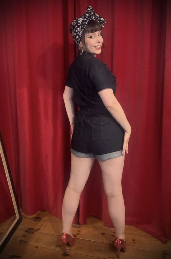 The Denim Romper is a midcentury-inspired all-in-one. It is fabulously saucy while incredibly wearable! Dark Blue denim for a 1940s feel.