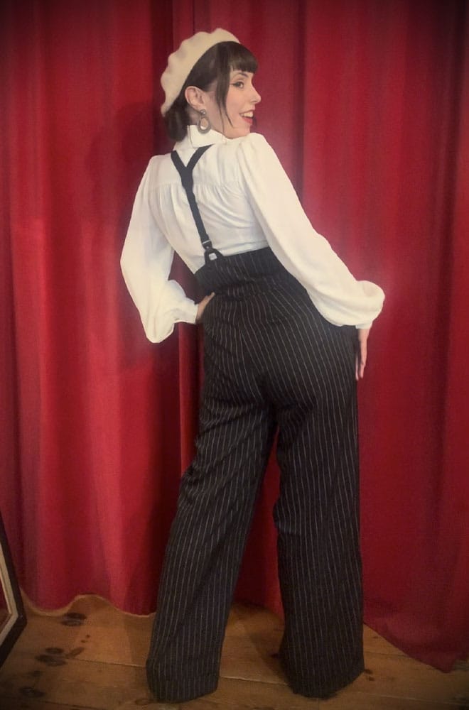 The Black Pinstripe Thelma Trousers are timeless, high-waisted, wide-legged Trousers. We adore the Thirties feel of these and they are oh-so-versatile.
