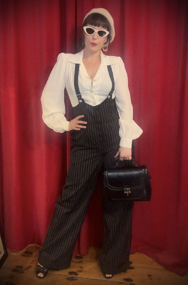 The Black Pinstripe Thelma Trousers are timeless, high-waisted, wide-legged Trousers. We adore the Thirties feel of these and they are oh-so-versatile.