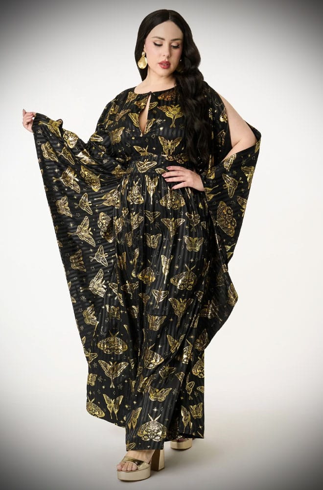 We just couldn't resist this 60s-inspired black and gold Moth Caftan. So much drama & glamour, all wrapped into one. Available in a UK 8 - 20.