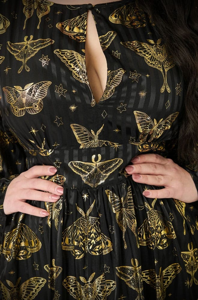 We just couldn't resist this 60s-inspired black and gold Moth Caftan. So much drama & glamour, all wrapped into one. Available in a UK 8 - 20.