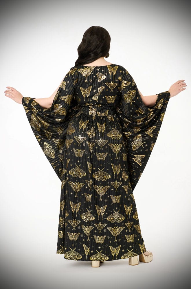 We just couldn't resist this 60s-inspired black and gold Moth Caftan. So much drama & glamour, all wrapped into one. Available in a UK 8 - 20.