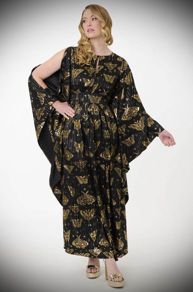 We just couldn't resist this 60s-inspired black and gold Moth Caftan. So much drama & glamour, all wrapped into one. Available in a UK 8 - 20.
