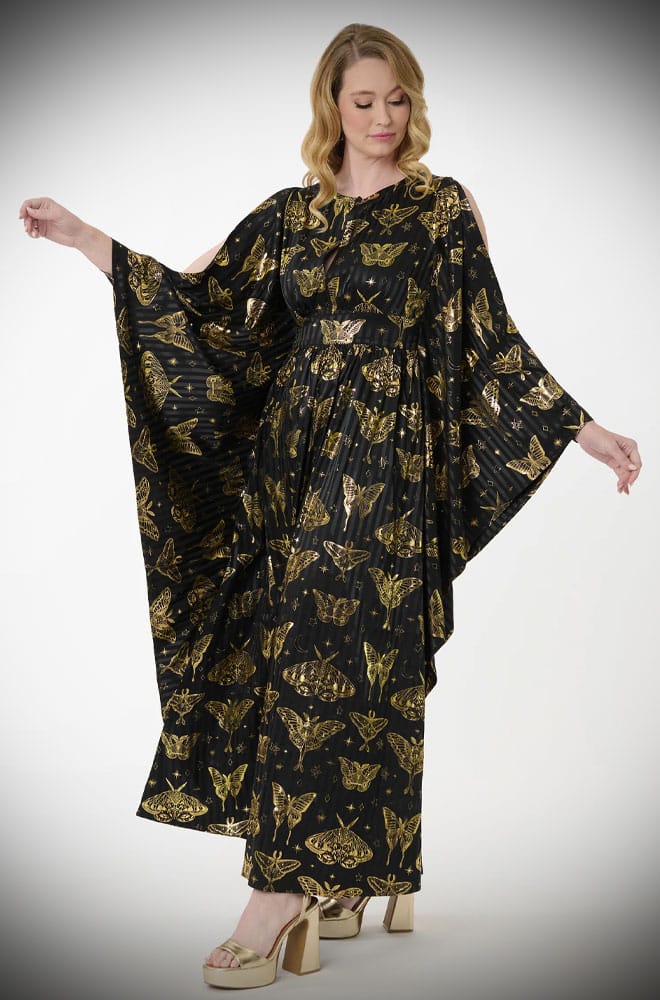 We just couldn't resist this 60s-inspired black and gold Moth Caftan. So much drama & glamour, all wrapped into one. Available in a UK 8 - 20.