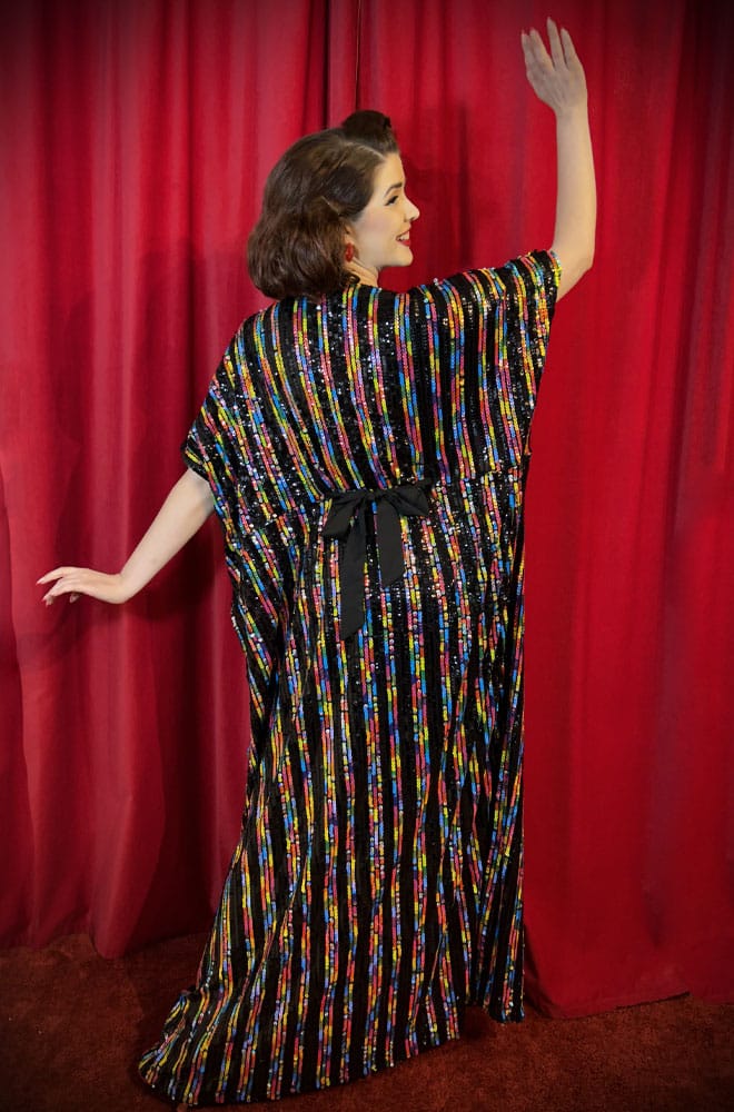 Rainbow Sequin Caftan - a 70s style Caftan. Dance the night away in comfort in this striking dress. So much fun & glamour, all wrapped into one.