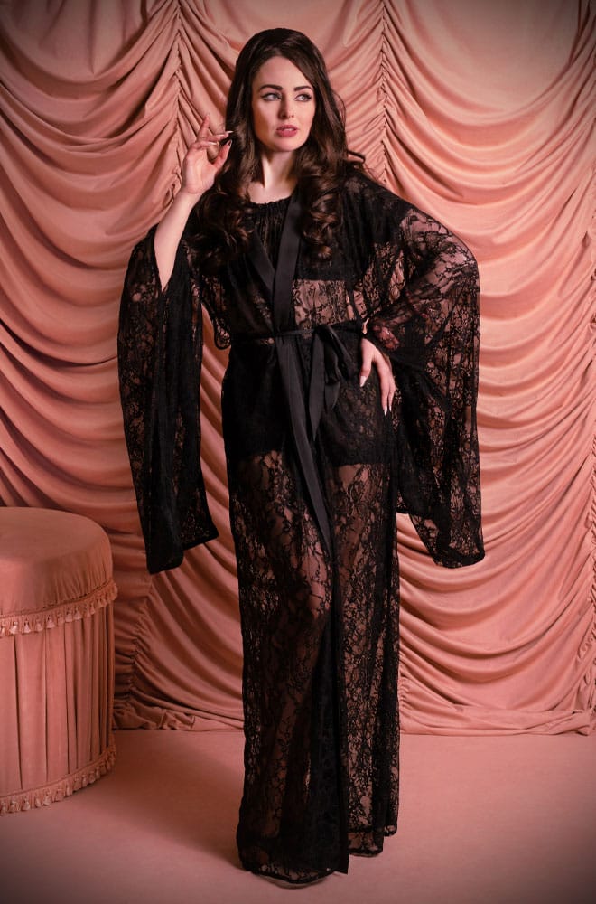 The Black Lace Kimono brings dramatic elegance to your loungewear wardrobe. Crafted in exquisite black lace, this full-length kimono offers maximum drama.