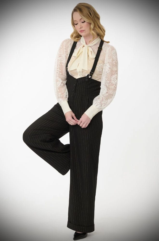 The Gold Pinstripe Thelma Trousers are timeless, high-waisted, wide-legged Trousers. We adore the Thirties feel of these and they are oh-so-versatile.