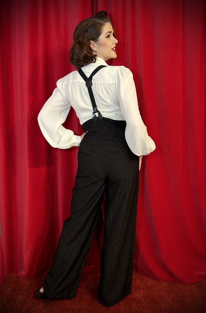 The Gold Pinstripe Thelma Trousers are timeless, high-waisted, wide-legged Trousers. We adore the Thirties feel of these and they are oh-so-versatile.