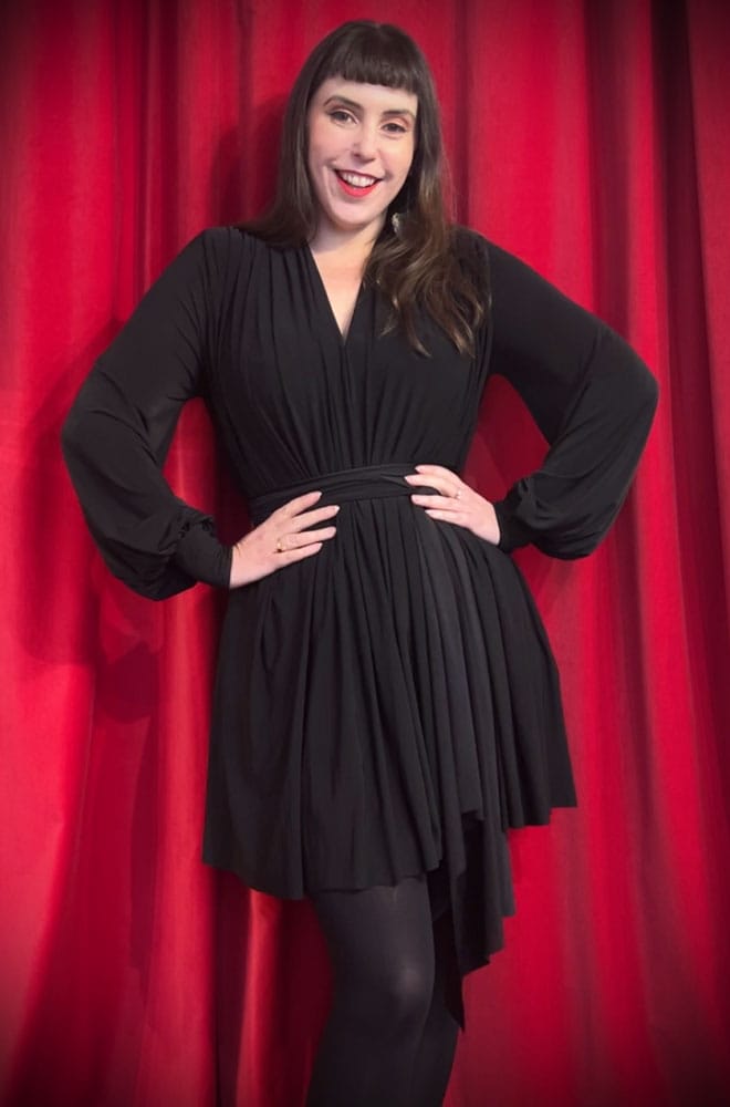 The Claudina Mini Dress is a one size, draped jersey dress with sash waist & bishop sleeves. A signature piece by Alexandra King for Deadly is the Female.