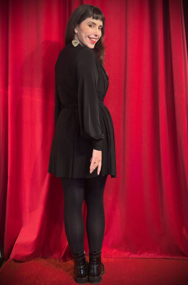 The Claudina Mini Dress is a one size, draped jersey dress with sash waist & bishop sleeves. A signature piece by Alexandra King for Deadly is the Female.