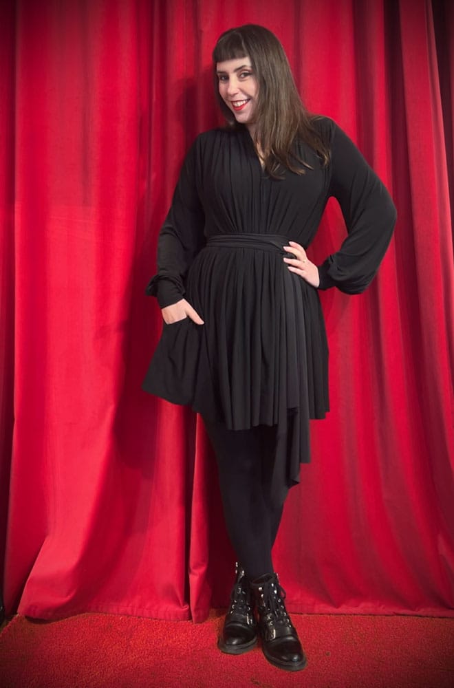 The Claudina Mini Dress is a one size, draped jersey dress with sash waist & bishop sleeves. A signature piece by Alexandra King for Deadly is the Female.