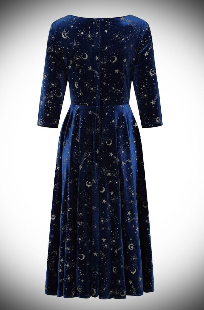Calling all goddesses! The Celeste Swing Dress is a gorgeous velvet swing dress with a glittering celestial print and pockets!