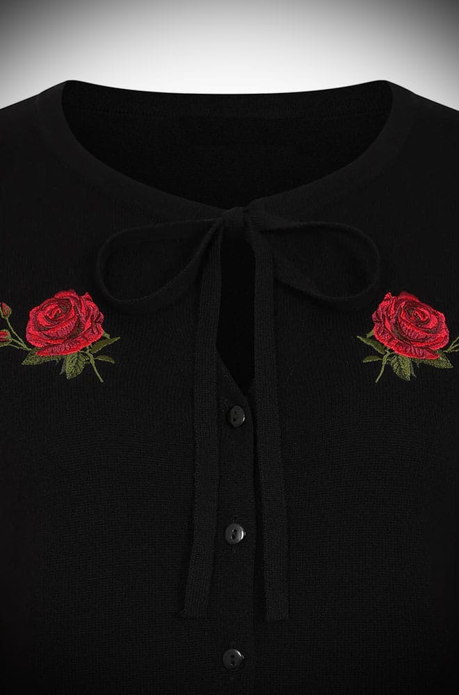A chic vintage-inspired Rose Cardigan in the softest black knit with embroidered rose motif & bow at the neck.