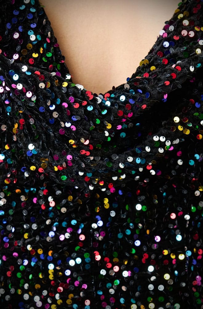 The Rainbow Sequin Goldwyn Gown is an absolute show-stopper. Blending old Hollywood glamour with multicoloured sequins, this dress is guaranteed to turn heads!