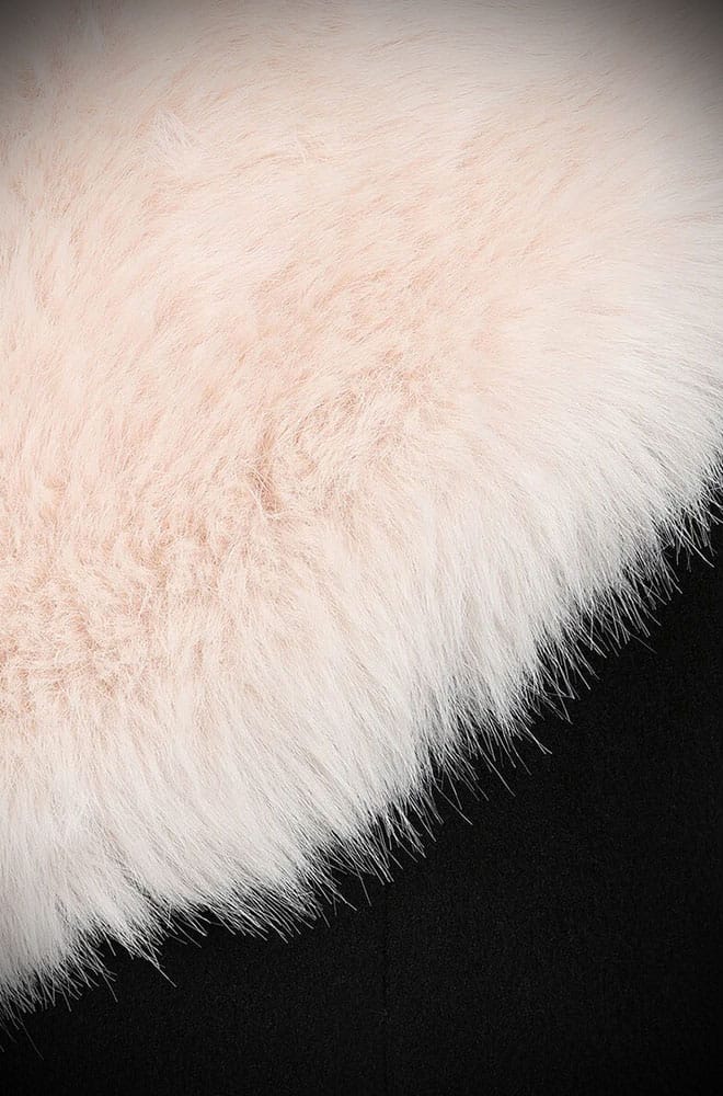 The glamour! The Fur Collar Swing Coat is a stunning vintage-inspired coat in black with luxurious ivory fur at the collar and cuffs. 