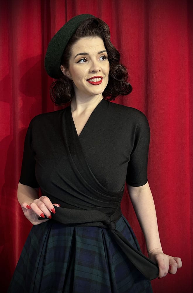 This chic Knit Wrap Top is a gorgeous top and also works as a cardigan. The perfect top if you've ever wanted to steal Audrey Hepburn's style. 