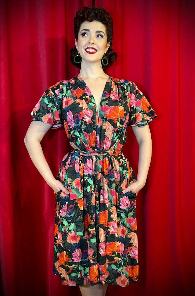 The Country Garden Claudia Dress is a 40s style, one-size dress with sash waist. A signature piece by Alexandra King for Deadly is the Female.