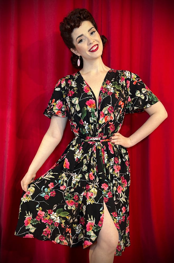 The Tropical Bloom Claudia Dress is a 40s style, one-size dress with sash waist. A signature piece by Alexandra King for Deadly is the Female.