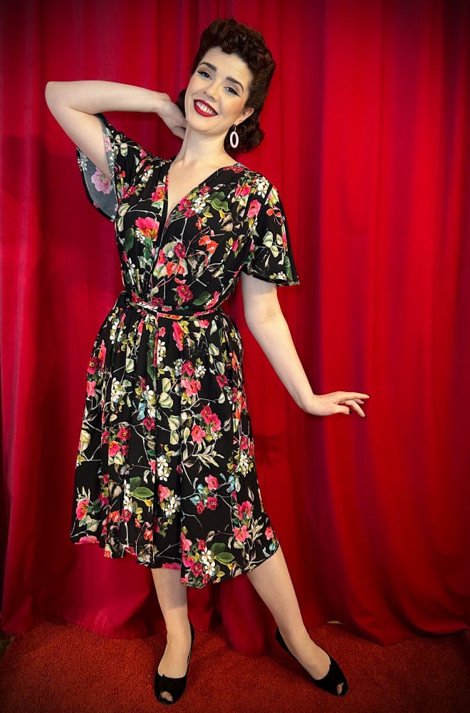 The Tropical Bloom Claudia Dress is a 40s style, one-size dress with sash waist. A signature piece by Alexandra King for Deadly is the Female.